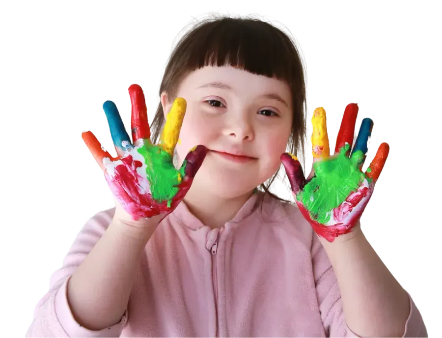 A young girl proudly showing her colourfully painted hands