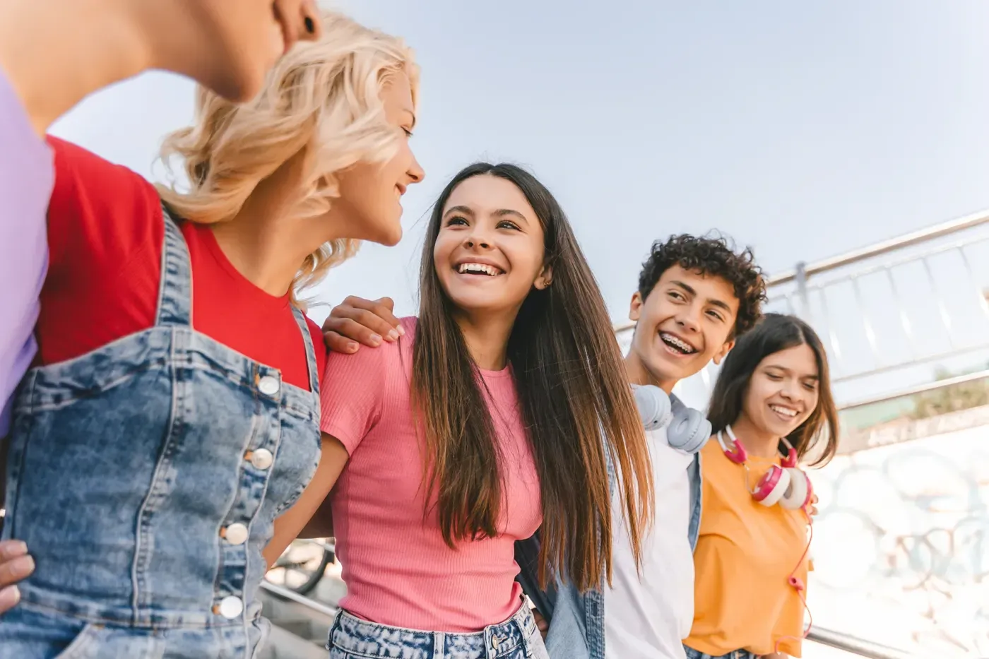 A joyful group of support workers outdoors